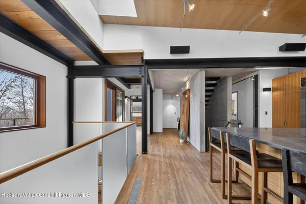 a room with a table and chairs