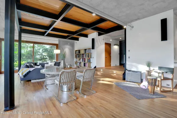 a view of wooden floor and glass door