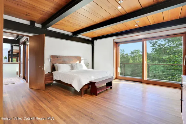 a living room with glass windows