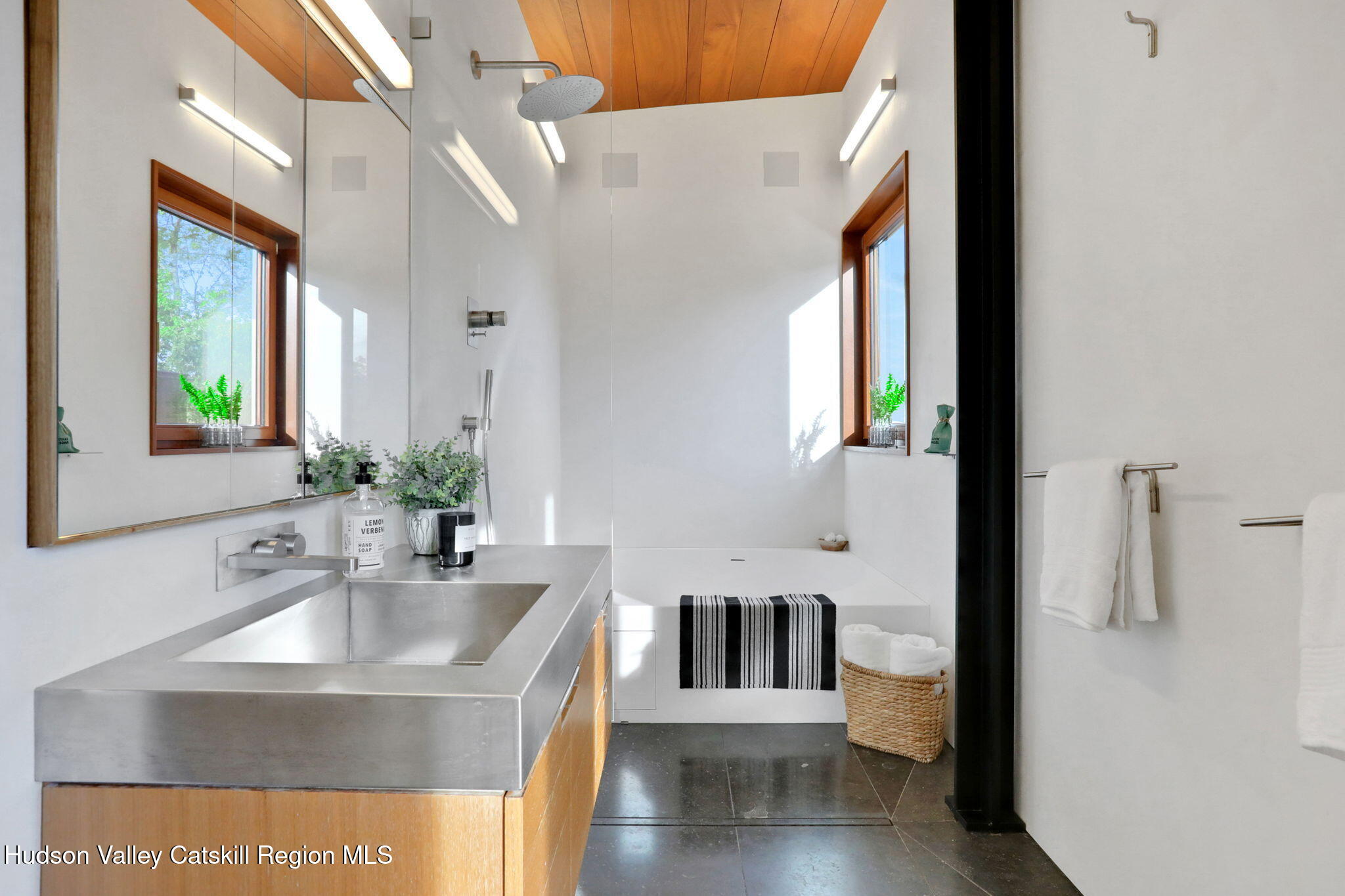 125 Valley View Way Willow, NY 12495 - Photo 40 of 103 a en suite bathroom with a sink and a mirror