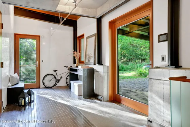 a view of hallway with wooden floor
