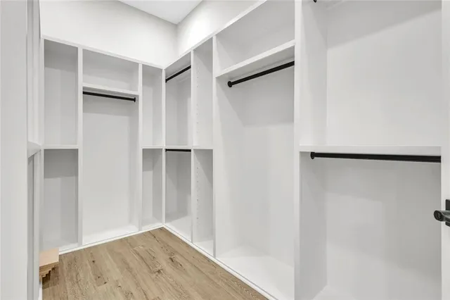 a view of an empty walk in closet