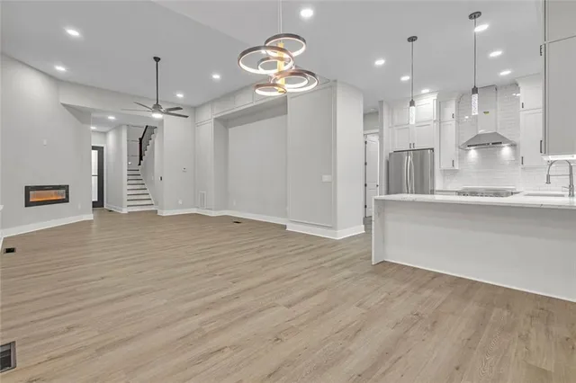 a view of a kitchen and a chandelier
