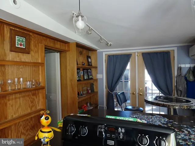 a view of living room with furniture and floor