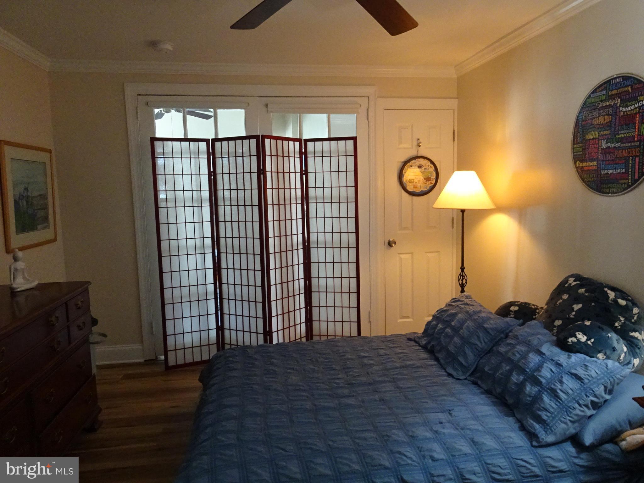 45 West 5th Street, Unit A New Castle, DE 19720 - Photo 14 of 21 a bedroom with a bed and a closet