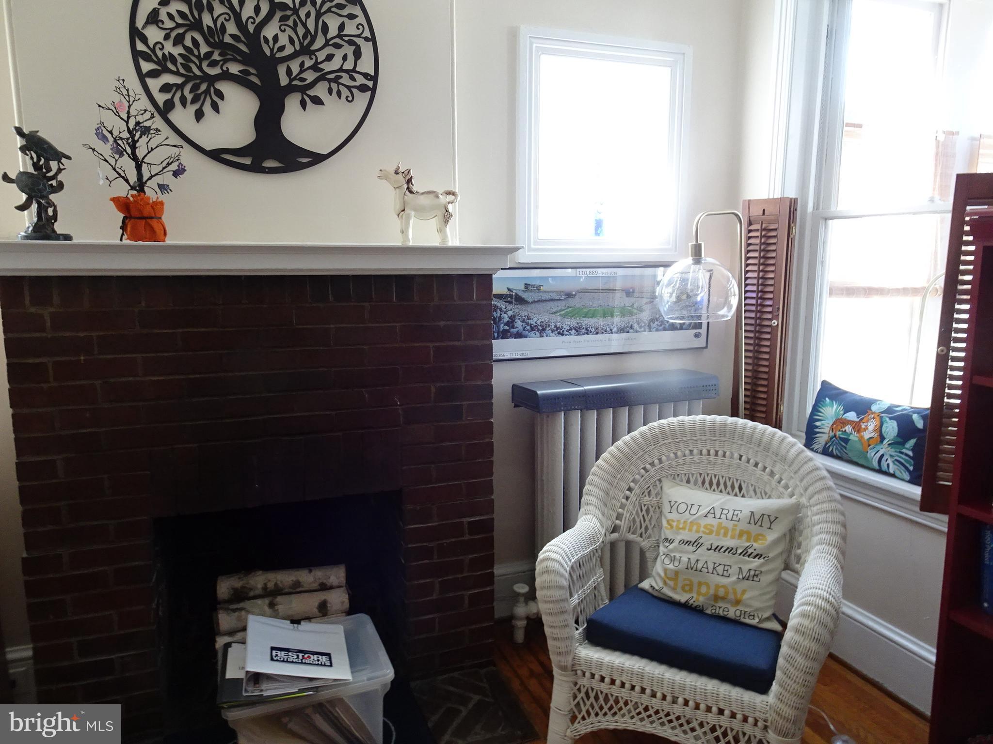 45 West 5th Street, Unit A New Castle, DE 19720 - Photo 7 of 21 a living room with furniture and a window