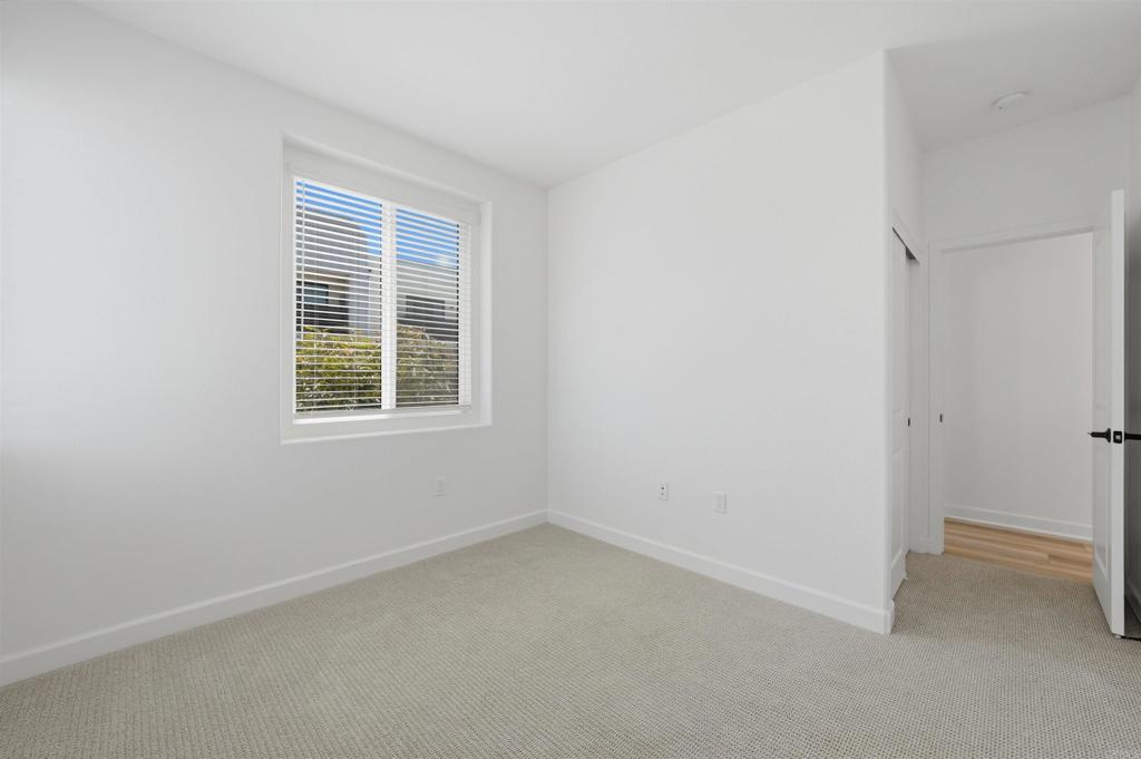 2402 Cascalote Loop San Diego, CA 92154 - Photo 18 of 35 an empty room with a window