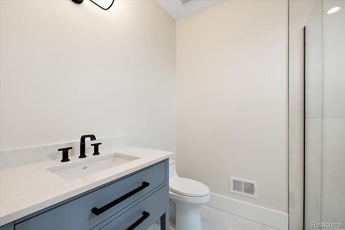 13459 Haddon Street Fenton, MI 48430 - Photo 53 of 84 Bathroom with vanity and light tile patterned floors