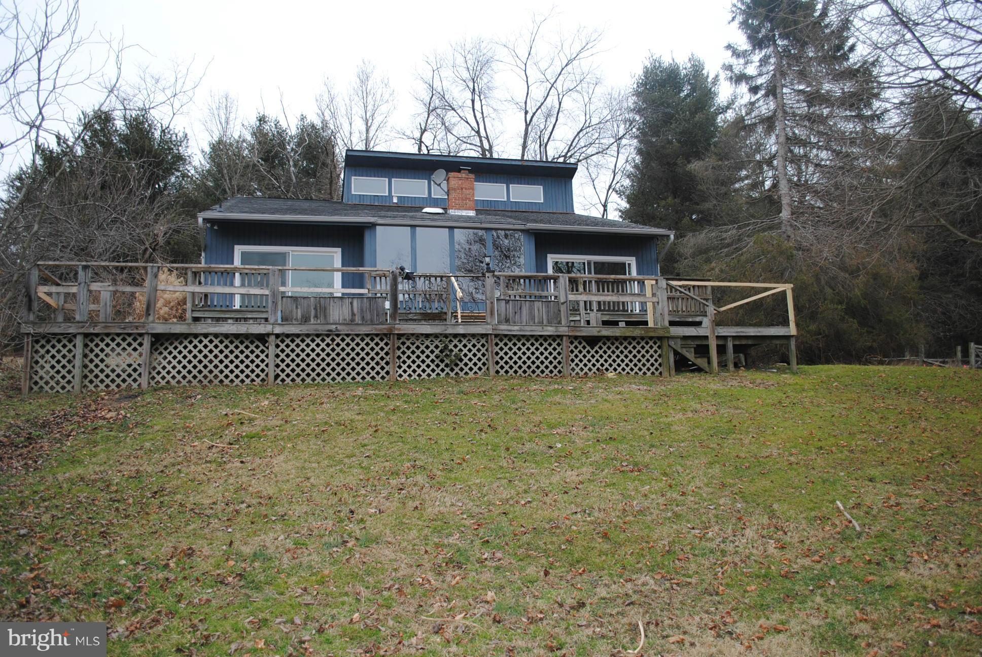 a view of a house with a roof deck