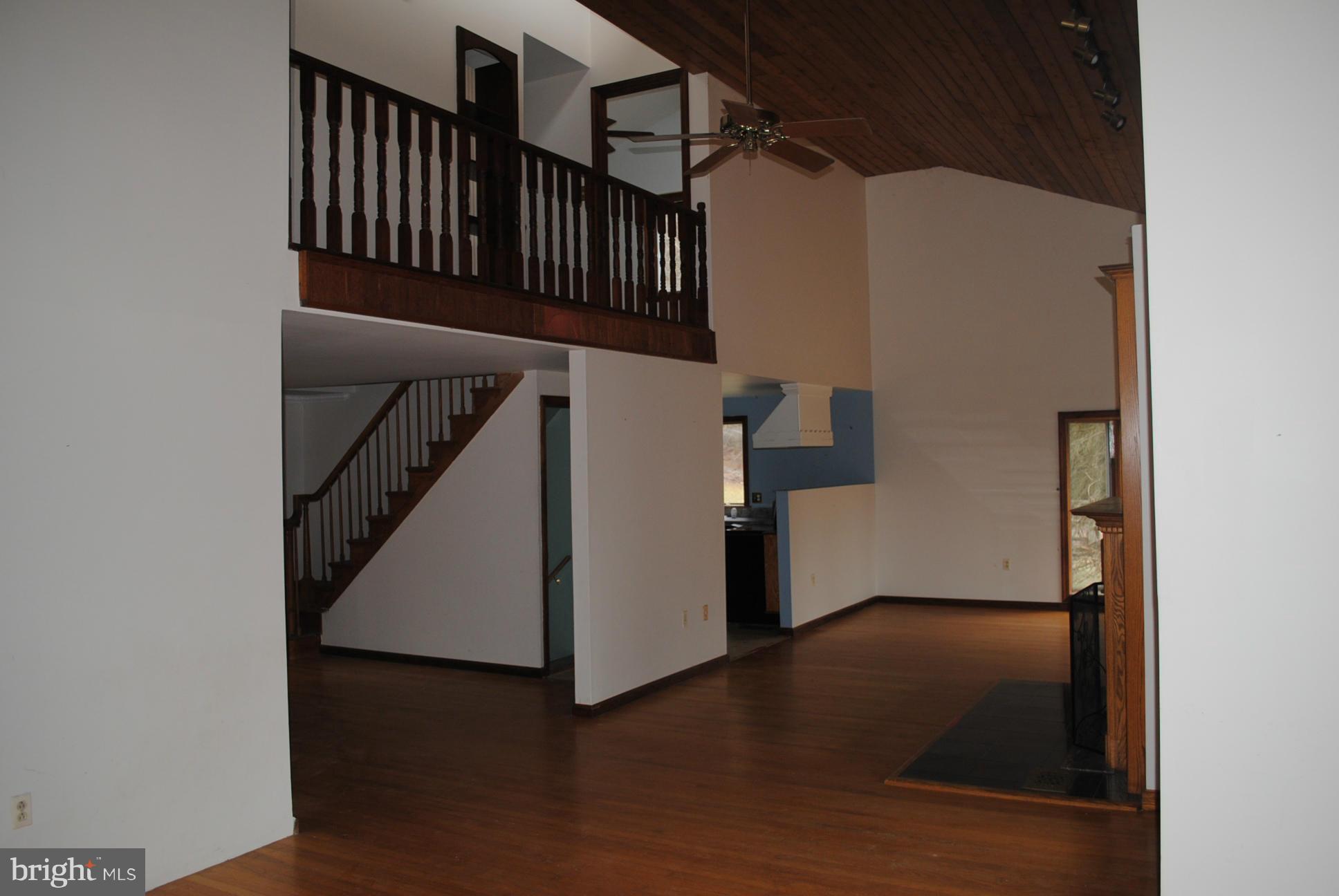 2614 Garrett Road White Hall, MD 21161 - Photo 12 of 27 an entryway in a hall with wooden floor