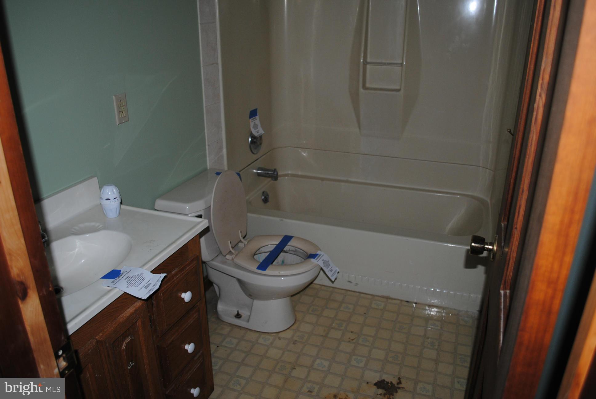 2614 Garrett Road White Hall, MD 21161 - Photo 16 of 27 a bathroom with a sink toilet and shower