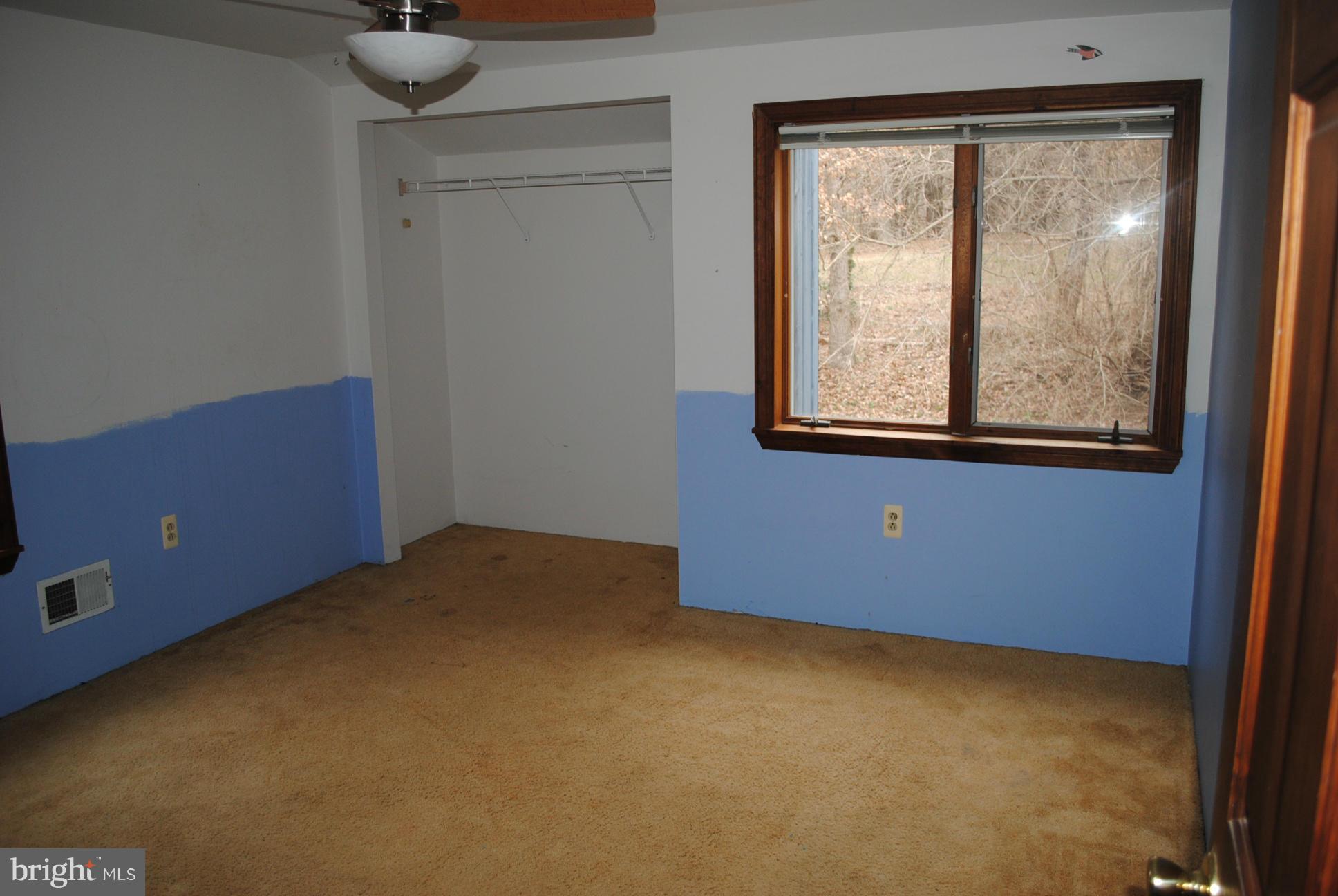 2614 Garrett Road White Hall, MD 21161 - Photo 17 of 27 a view of an empty room with a window
