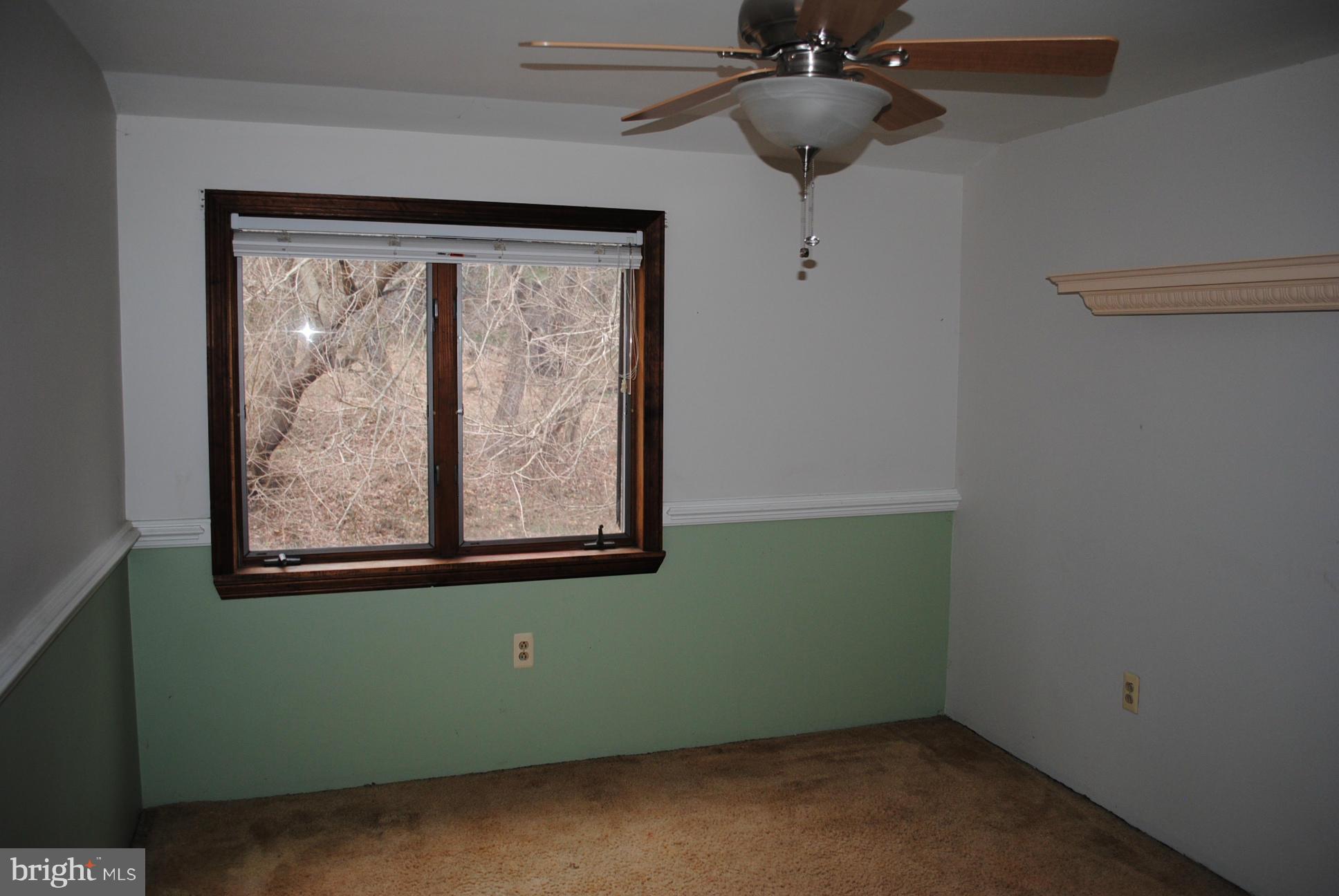 2614 Garrett Road White Hall, MD 21161 - Photo 18 of 27 a view of a small space with a fan & a window