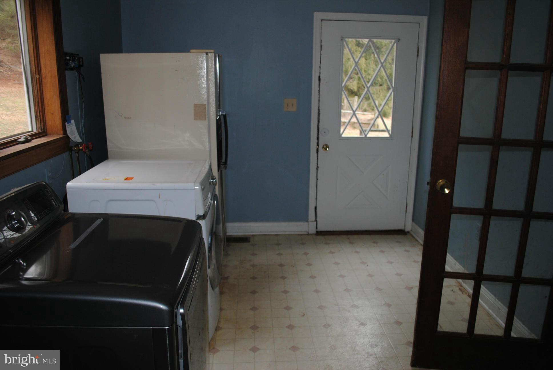 2614 Garrett Road White Hall, MD 21161 - Photo 7 of 27 a utility room with dryer and washer