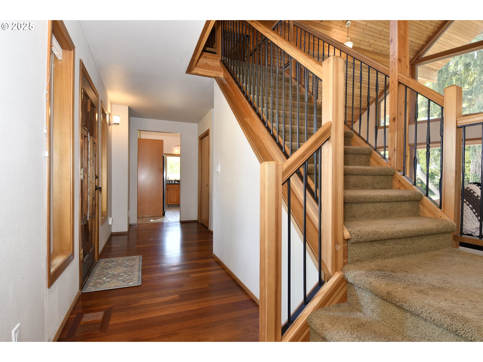 8325 Northeast Dog Ridge Road Newberg, OR 97132 - Photo 15 of 41 a view interior of a house with wooden floor and stairs