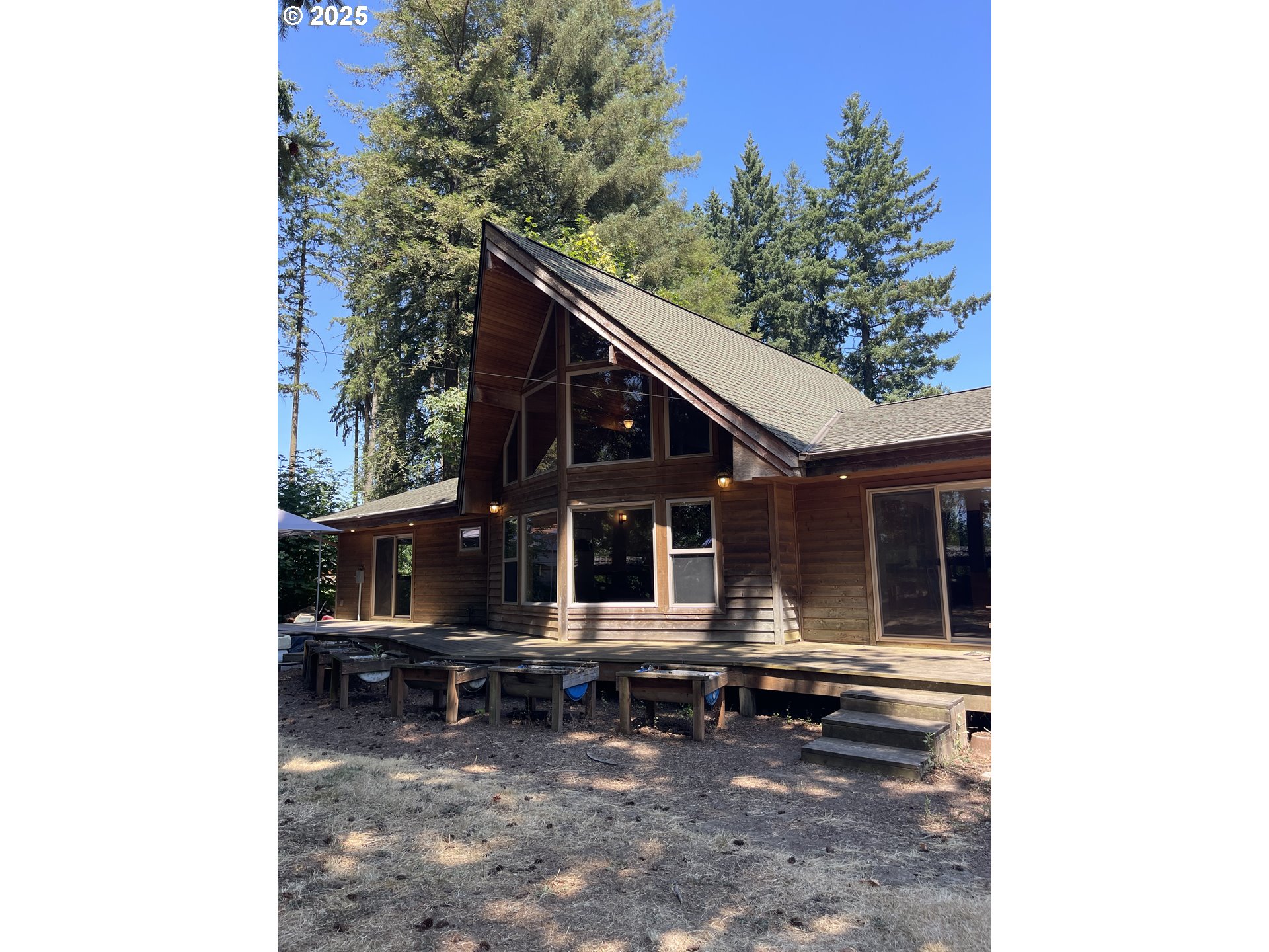 8325 Northeast Dog Ridge Road Newberg, OR 97132 - Photo 2 of 41 a house view with a outdoor space