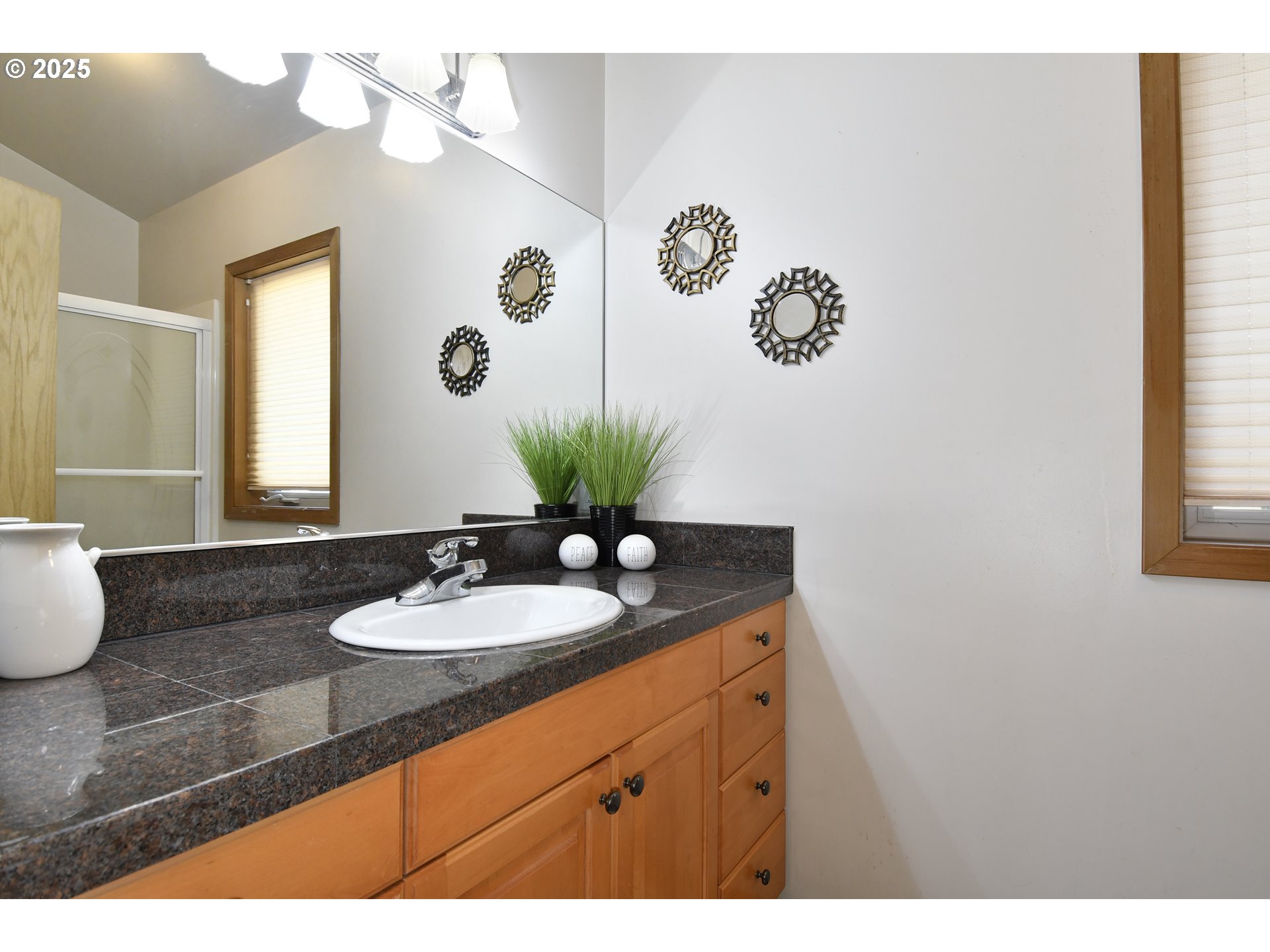 8325 Northeast Dog Ridge Road Newberg, OR 97132 - Photo 24 of 41 a bathroom with a granite countertop sink and a mirror