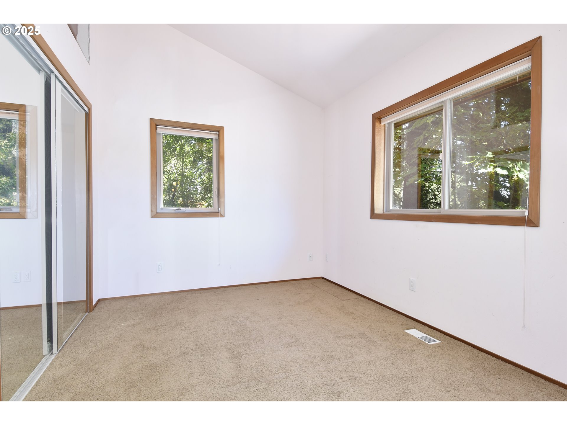 8325 Northeast Dog Ridge Road Newberg, OR 97132 - Photo 26 of 41 a view of an empty room with a window