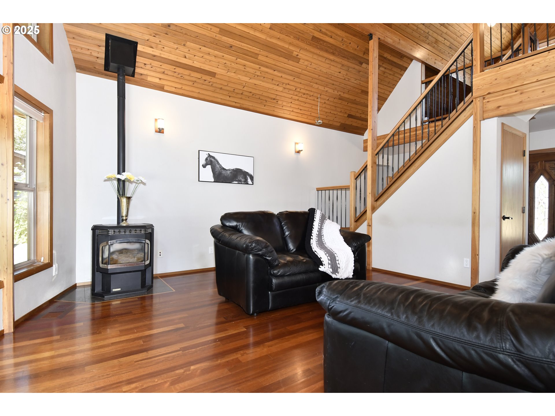 8325 Northeast Dog Ridge Road Newberg, OR 97132 - Photo 10 of 41 a living room with furniture and a wooden floor