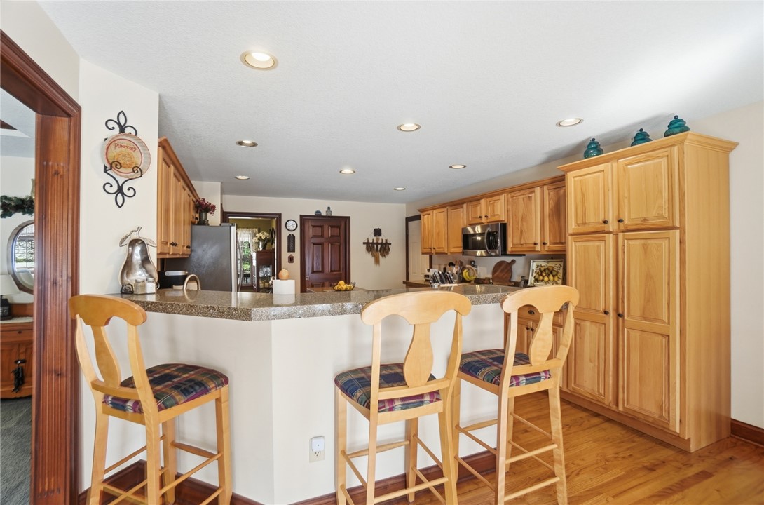 5300 Brookshire Lane Springfield, OH 45502 - Photo 16 of 56 This spacious kitchen offers a functional layout with ample cabinetry and a convenient breakfast bar.