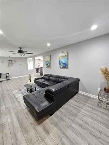 a living room with a couch and a window