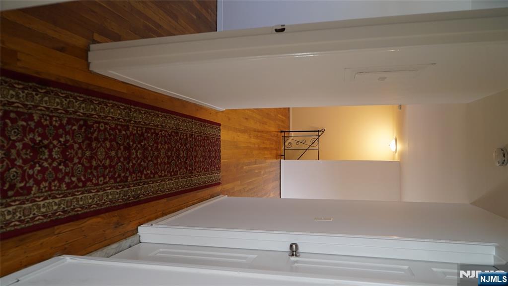 403 Anderson Avenue, Unit 4B Fairview, NJ 07022 - Photo 8 of 12 a view of a hallway