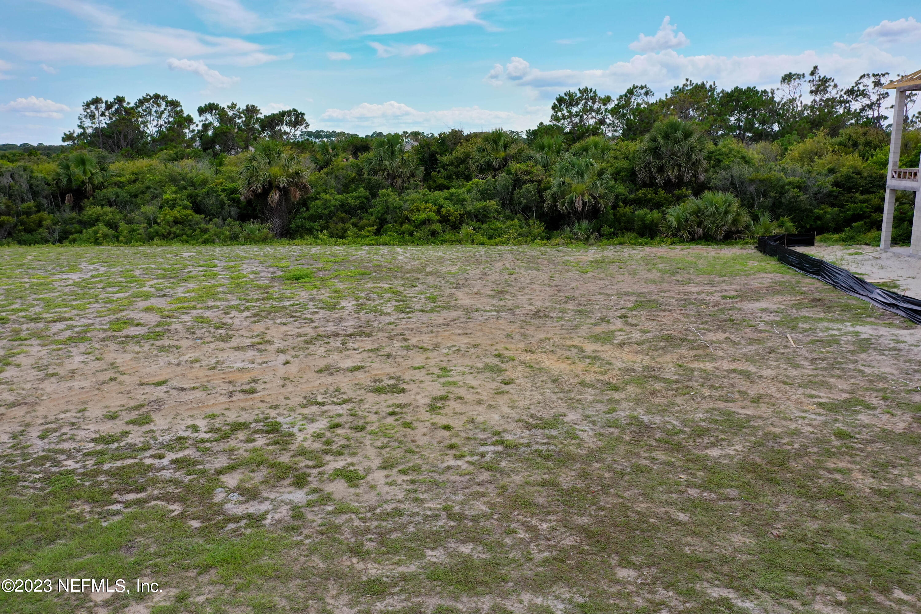11 Ocean Ridge Boulevard Palm Coast, FL 32137 - Photo 22 of 41 a view of a field with trees in the background
