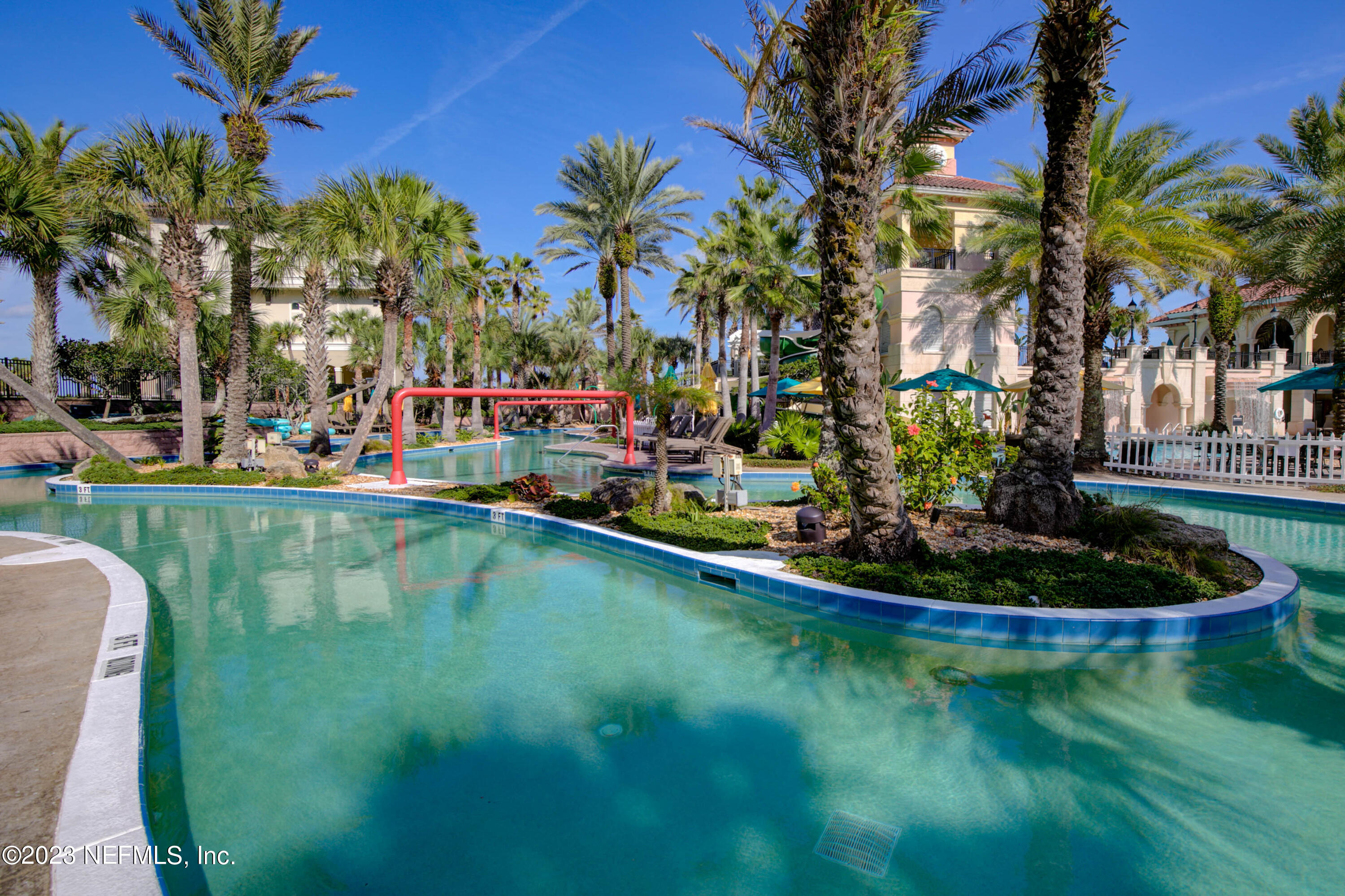 11 Ocean Ridge Boulevard Palm Coast, FL 32137 - Photo 29 of 41 a view of a swimming pool with a garden
