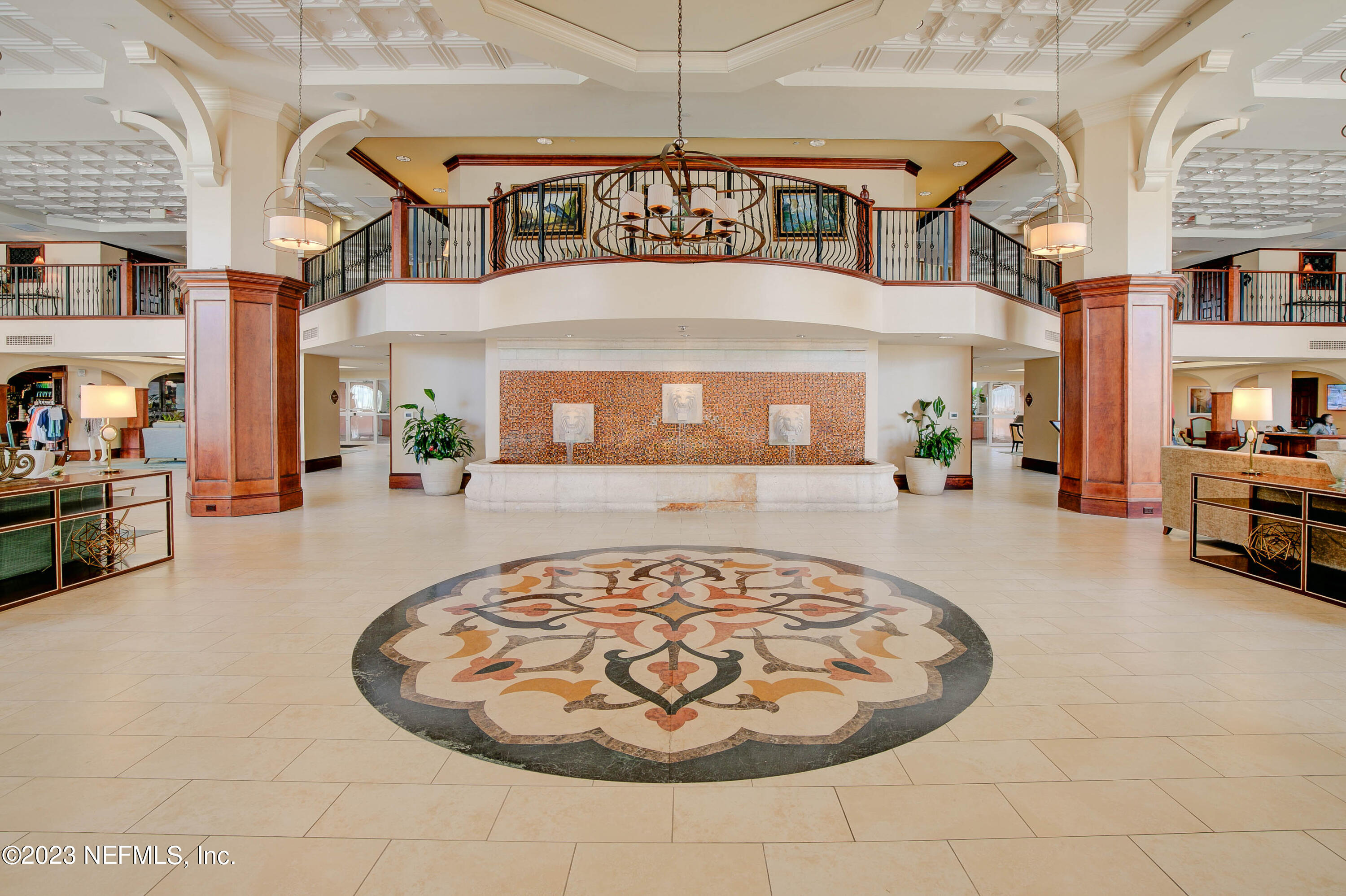 11 Ocean Ridge Boulevard Palm Coast, FL 32137 - Photo 36 of 41 a view of a living room and a chandelier
