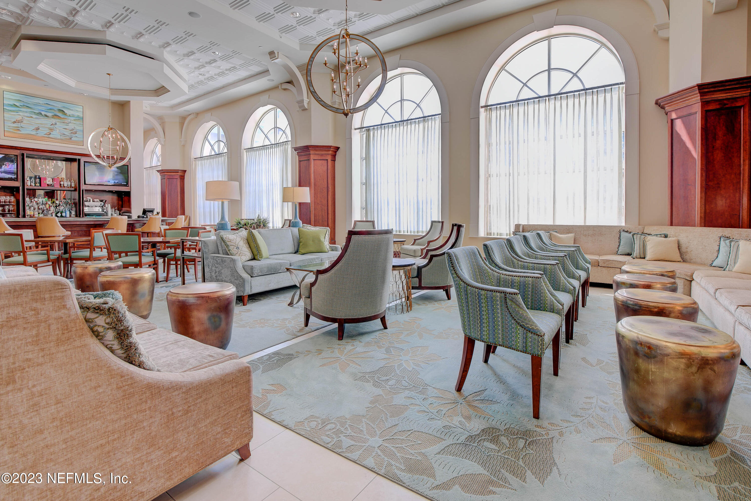 11 Ocean Ridge Boulevard Palm Coast, FL 32137 - Photo 37 of 41 a living room with furniture and a large window