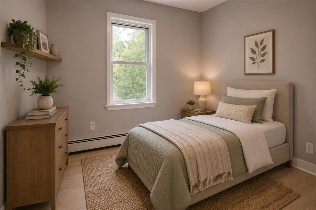 32 Dale Street Franklin, MA 02038 - Photo 8 of 11 a bedroom with a bed and a window