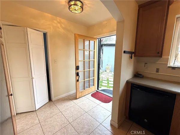 a spacious bathroom with a sink and a mirror