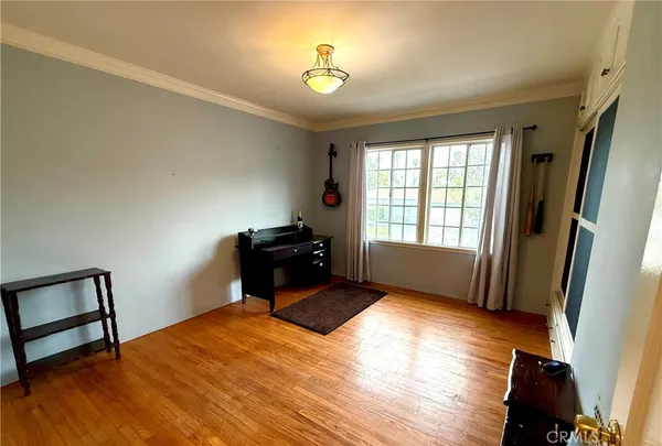 a bed room with a bed and a window