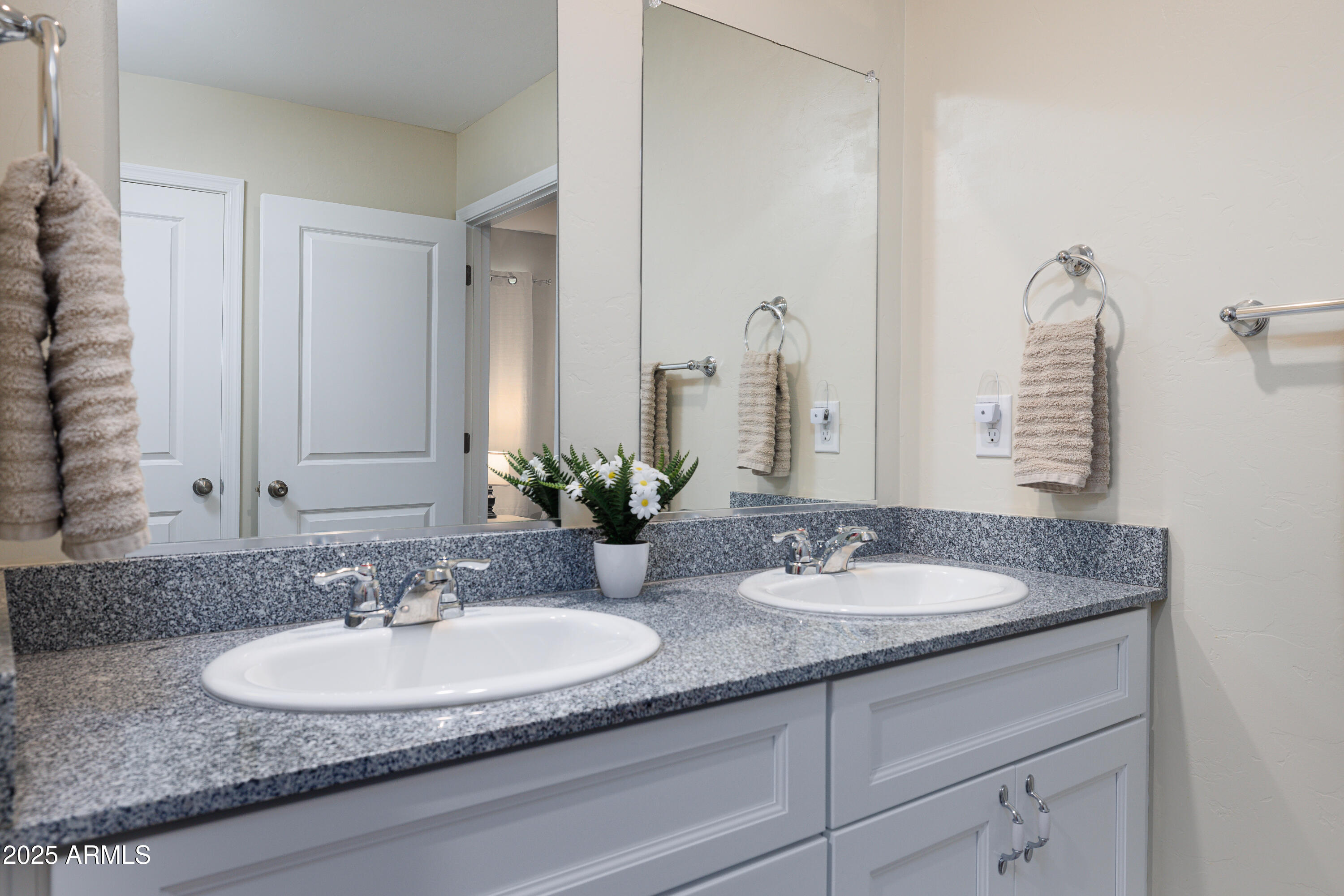 1256 South Lenora Loop Benson, AZ 85602 - Photo 20 of 34 a bathroom with a granite countertop sink and a mirror