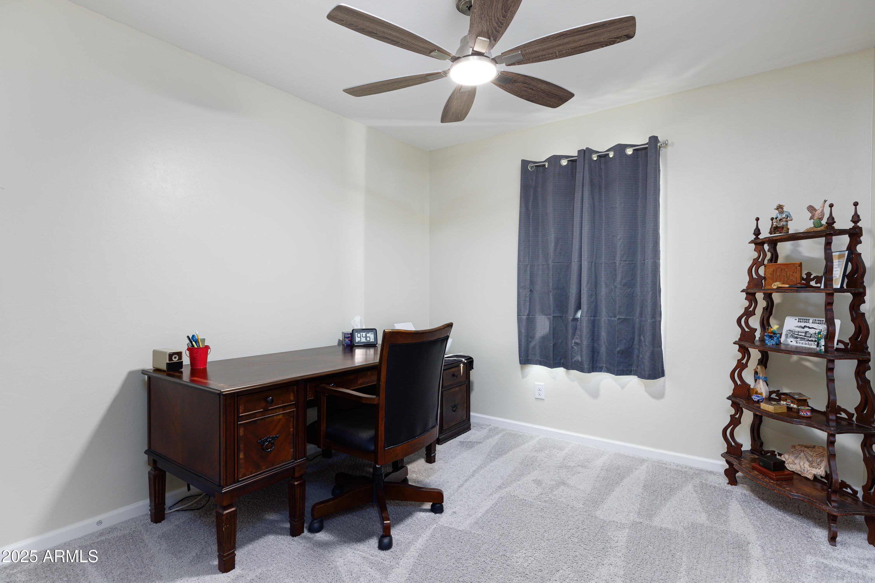 1256 South Lenora Loop Benson, AZ 85602 - Photo 24 of 34 a living room with furniture and a piano