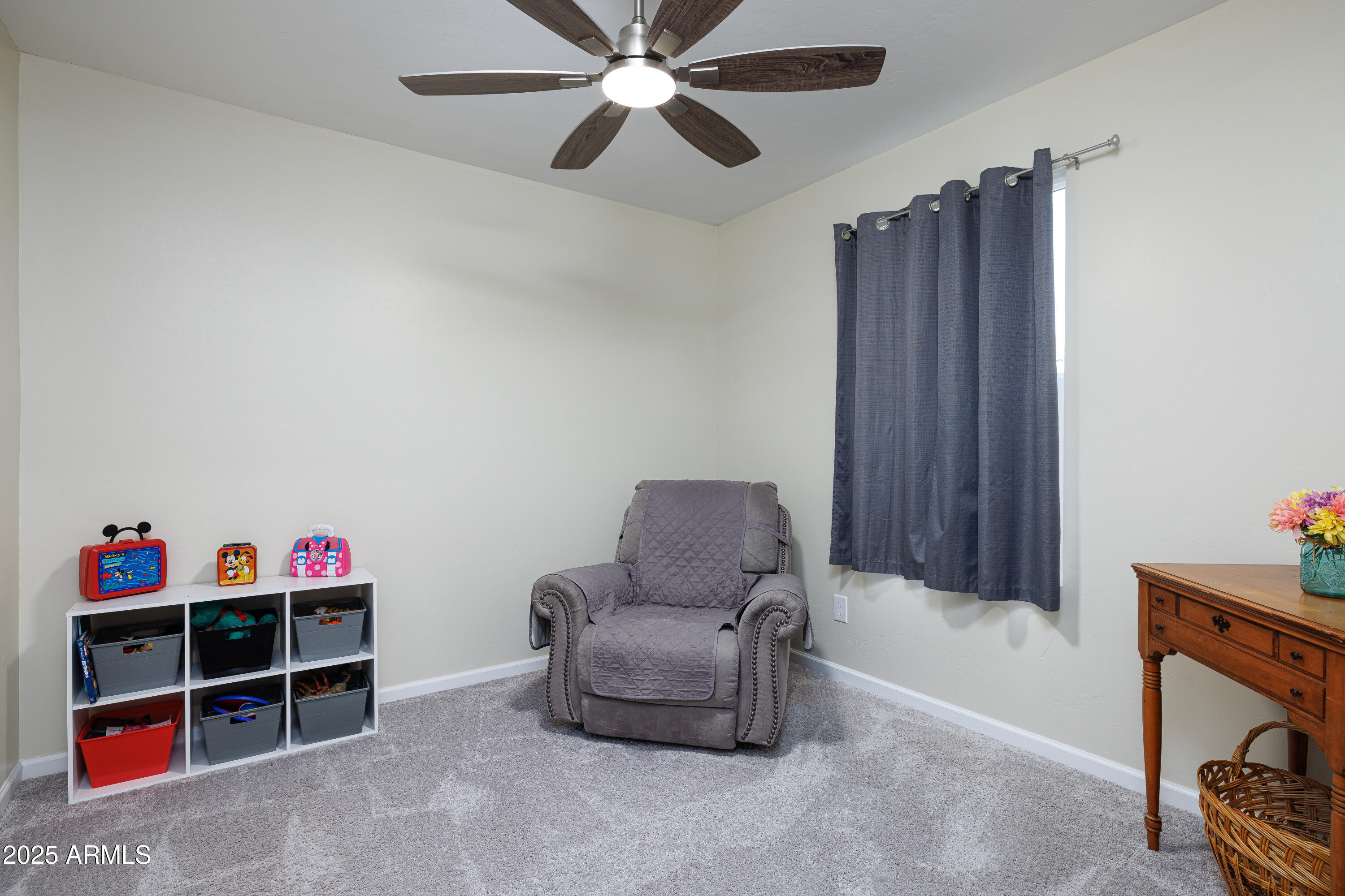 1256 South Lenora Loop Benson, AZ 85602 - Photo 26 of 34 a living room with furniture cabinets and a window
