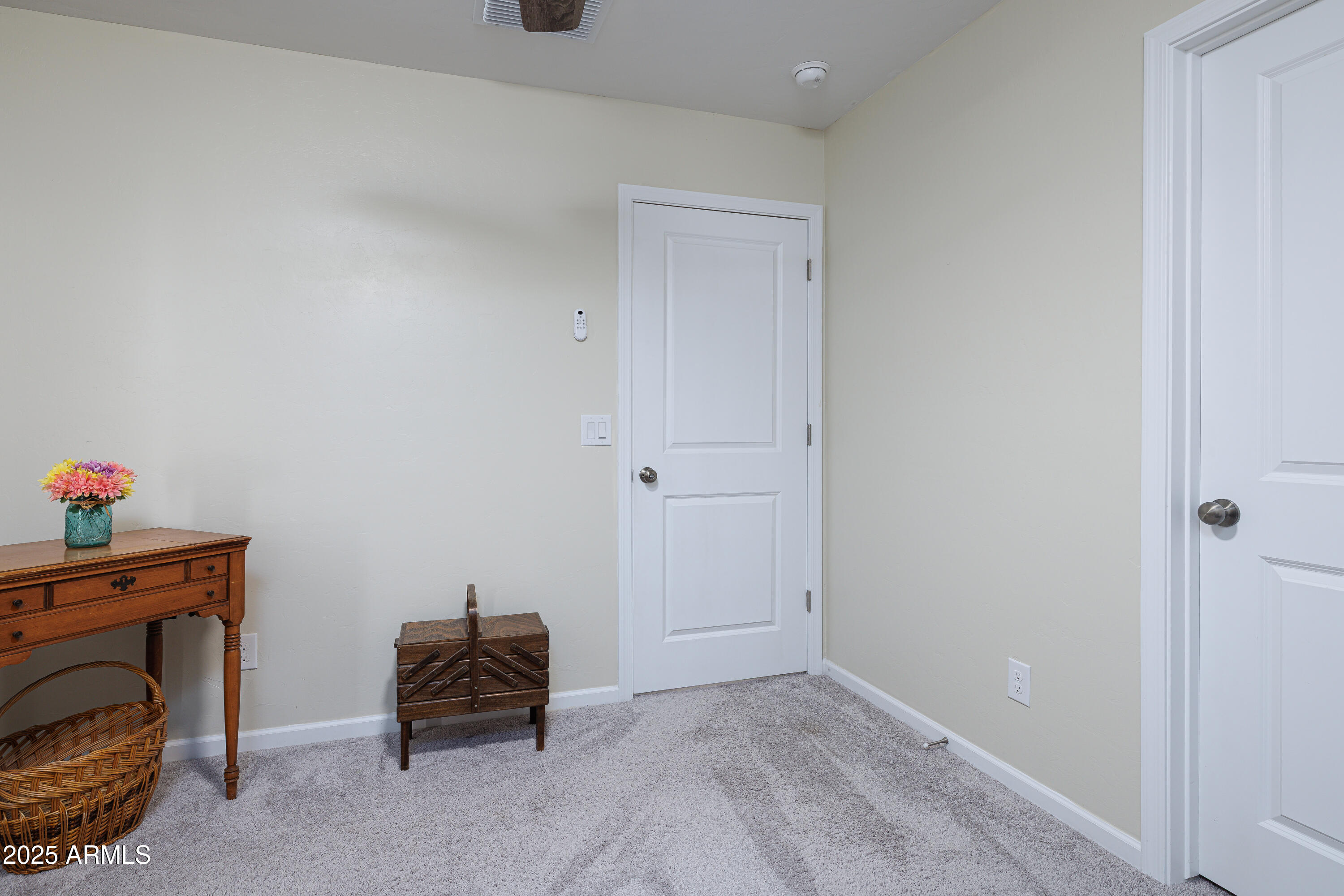1256 South Lenora Loop Benson, AZ 85602 - Photo 27 of 34 a room with furniture and a window