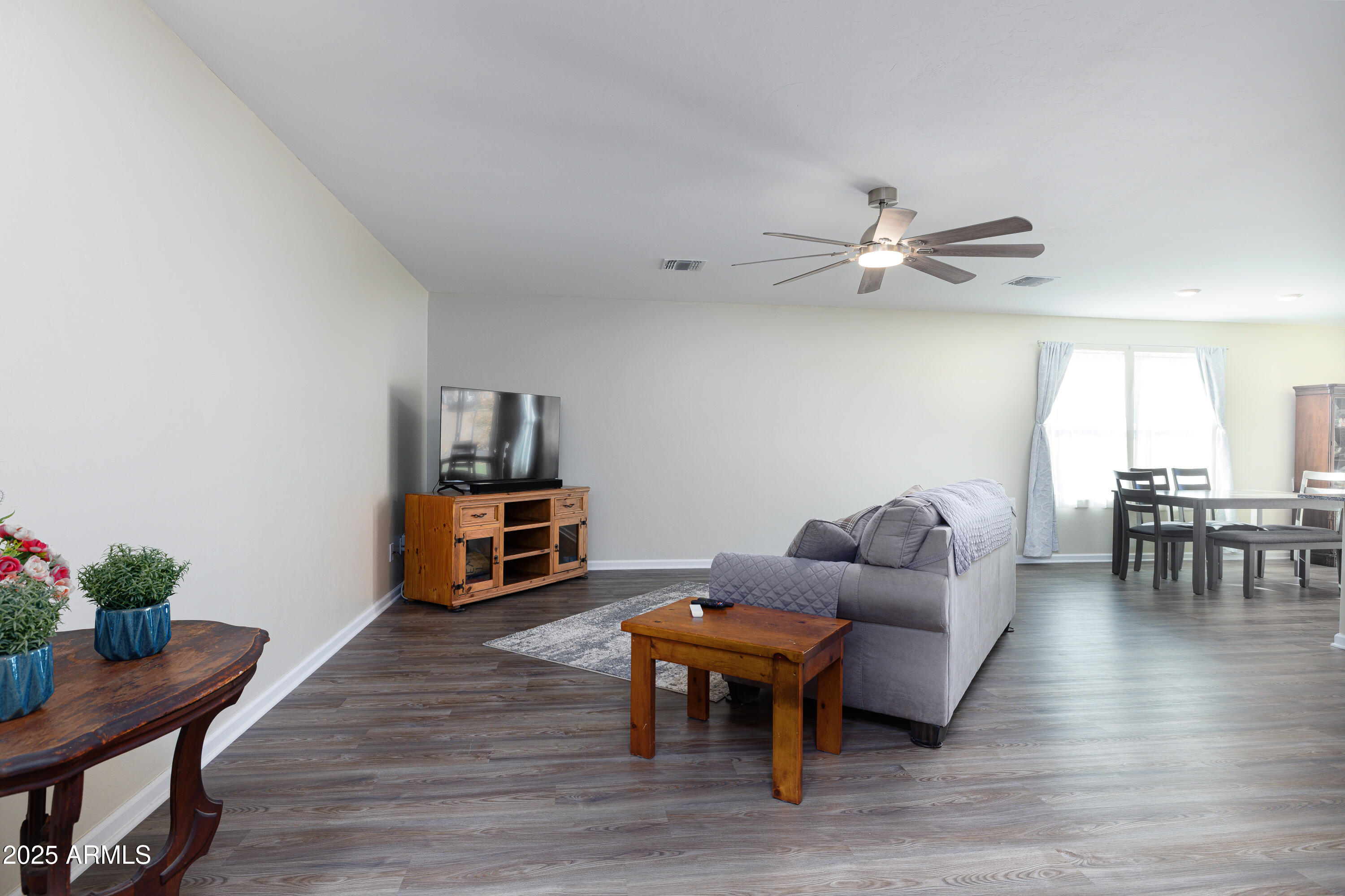 1256 South Lenora Loop Benson, AZ 85602 - Photo 7 of 34 a living room with furniture and wooden floor