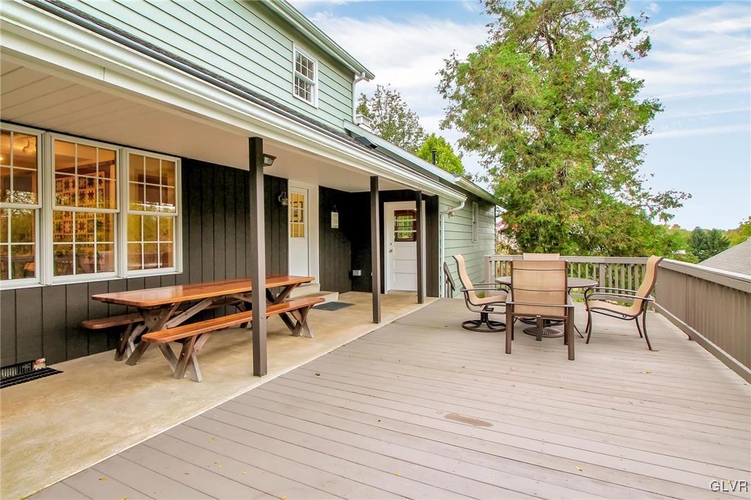 3505 Huckleberry Road Allentown, PA 18104 - Photo 23 of 29 a view of a house with chairs and table in a patio