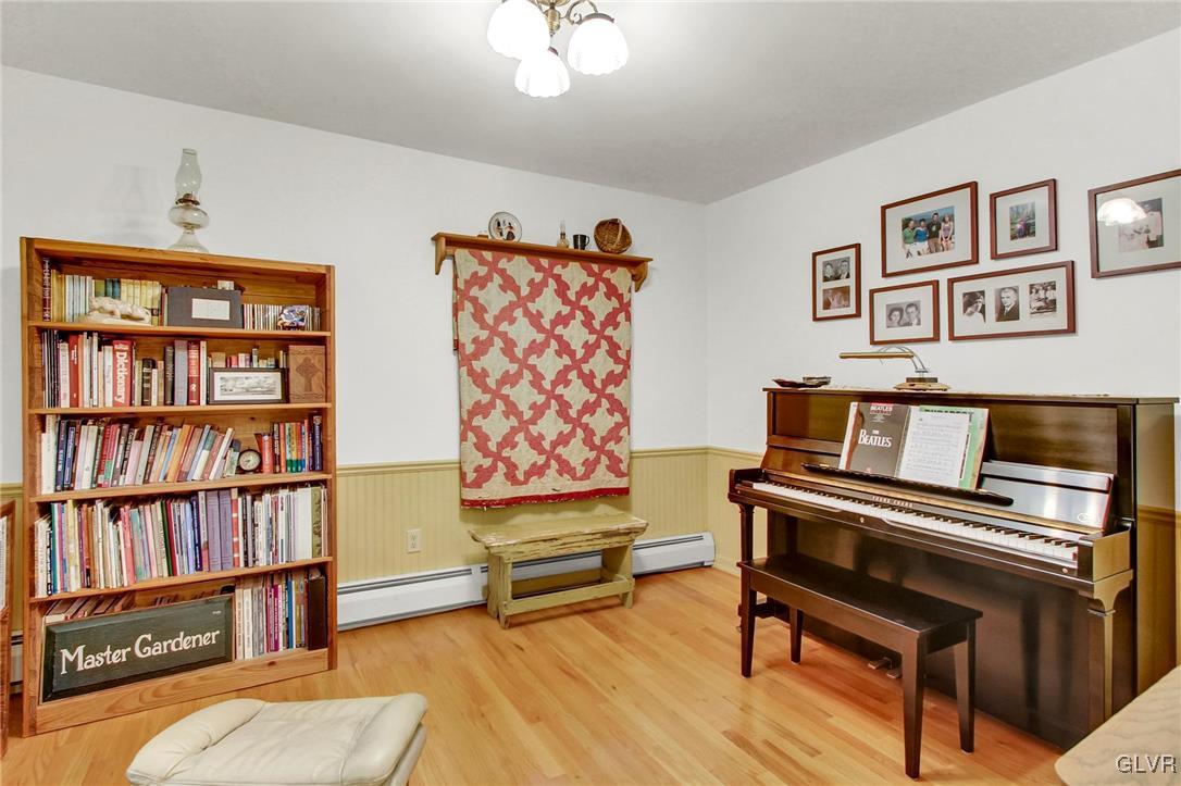 3505 Huckleberry Road Allentown, PA 18104 - Photo 6 of 29 a living room with furniture and book shelf