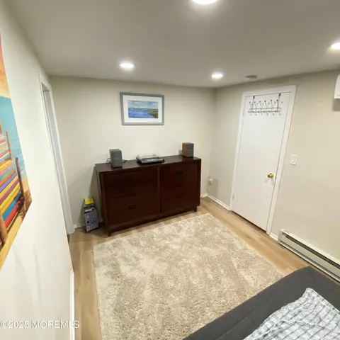 a view of a bedroom with cabinet