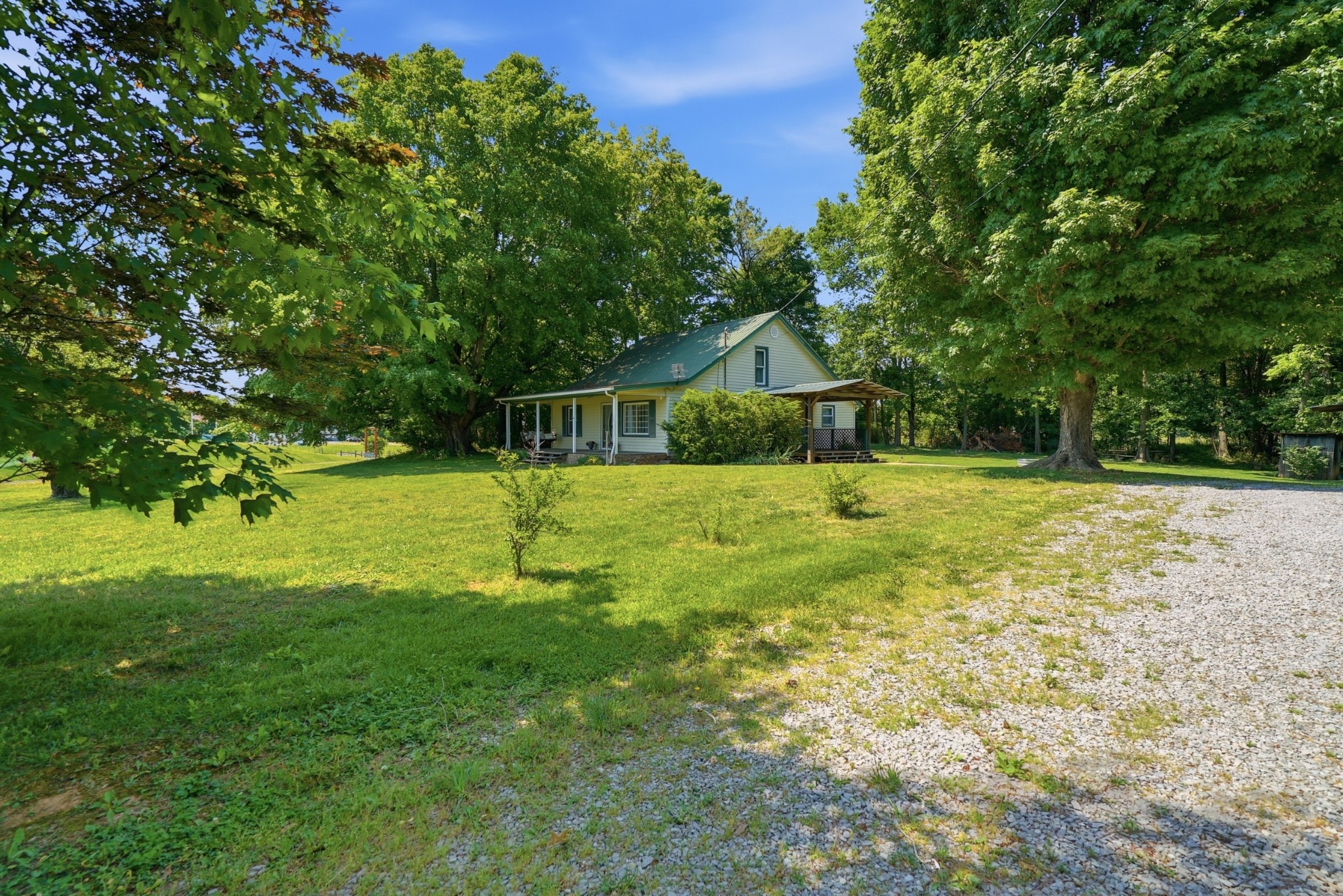 6471 Highway 161 Springfield, TN 37172 - Photo 5 of 57 a house view with a play ground in front of it