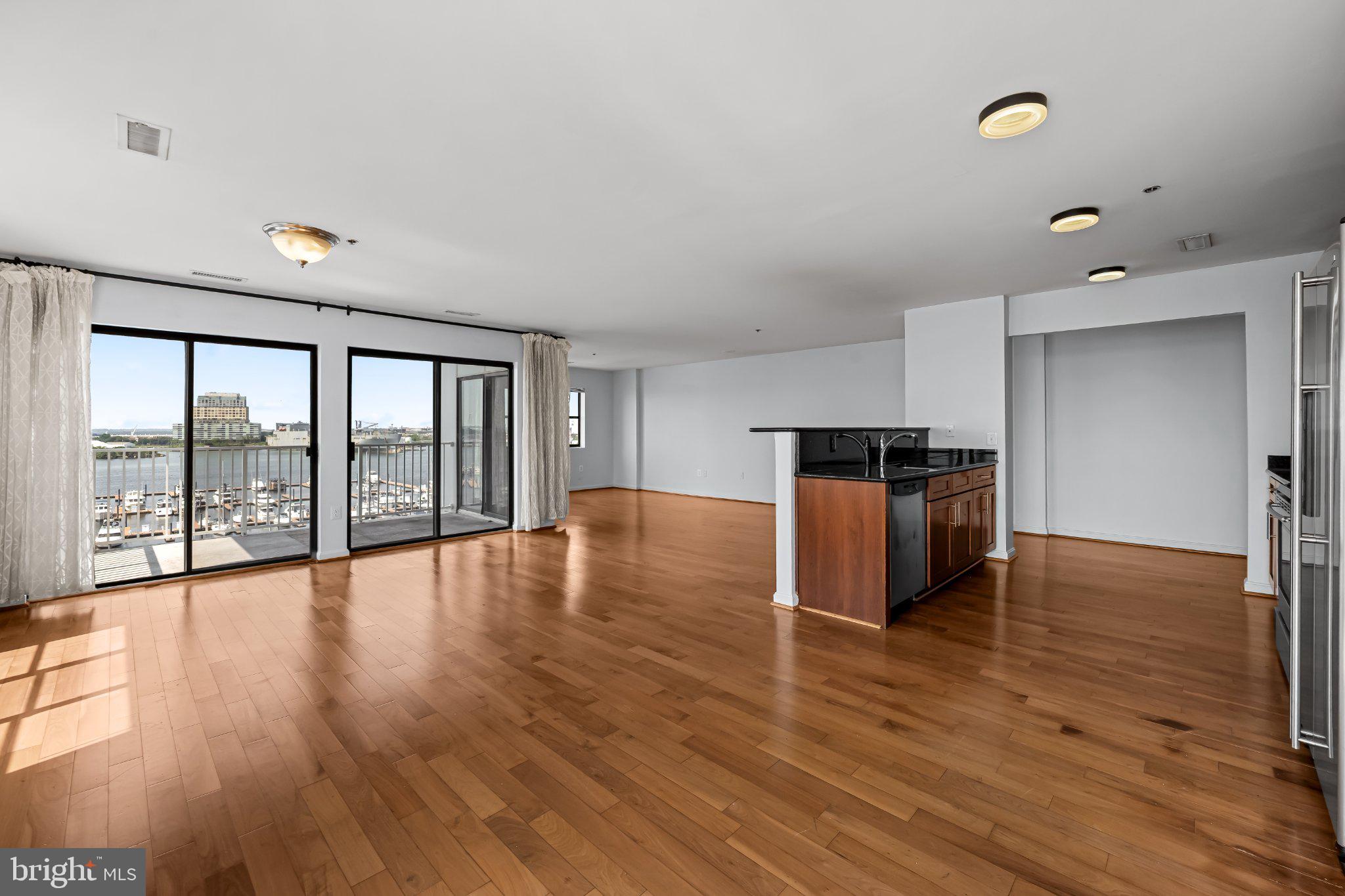 2702 Lighthouse Point East, Unit 738 Baltimore, MD 21224 - Photo 10 of 33 Spacious urban retreat with skyline views.