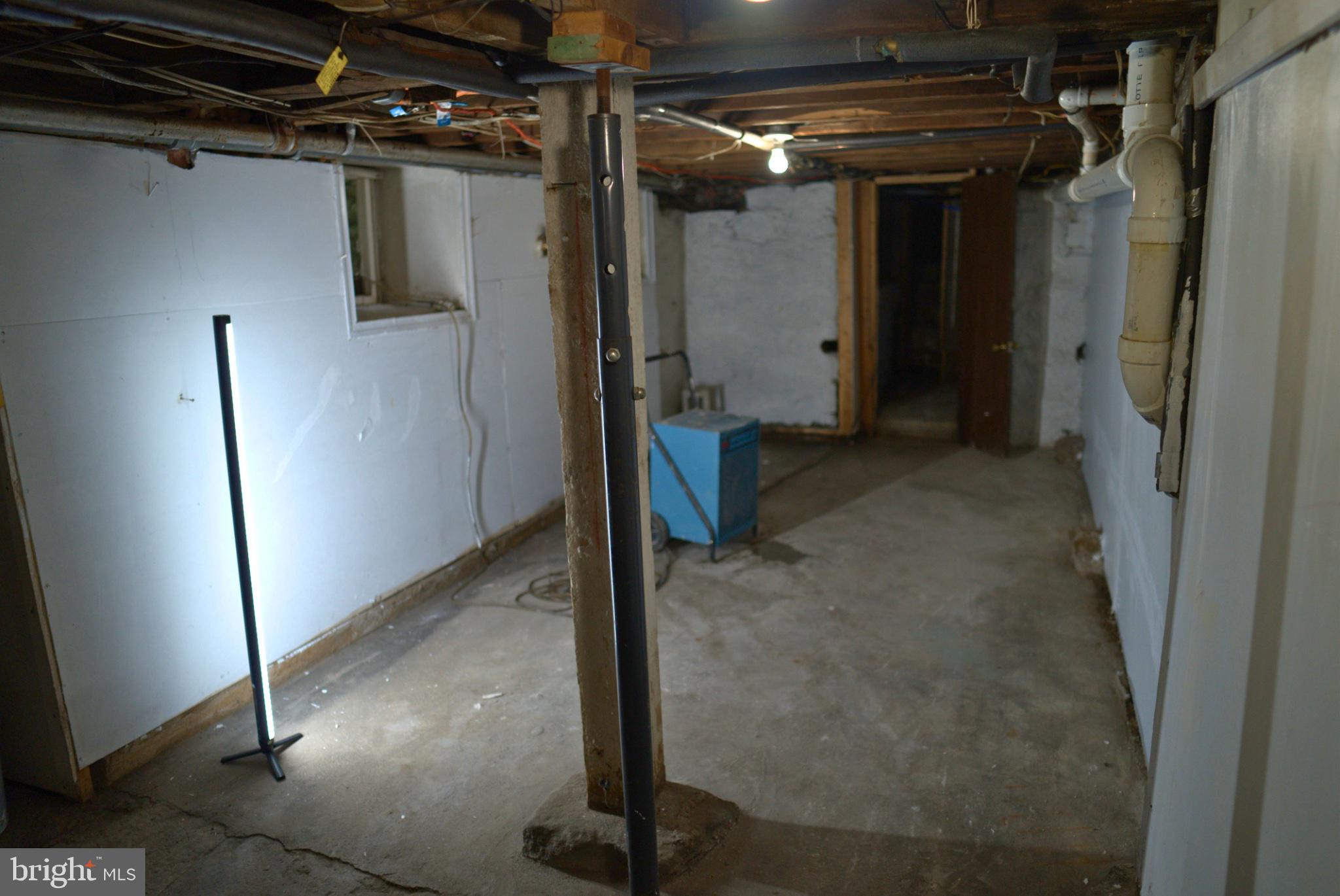 74 South Cedar Street Hazleton, PA 18201 - Photo 15 of 15 Spacious unfinished basement awaits ideas.