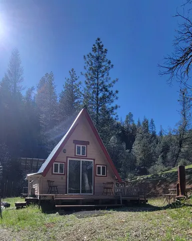 a house with trees in the background