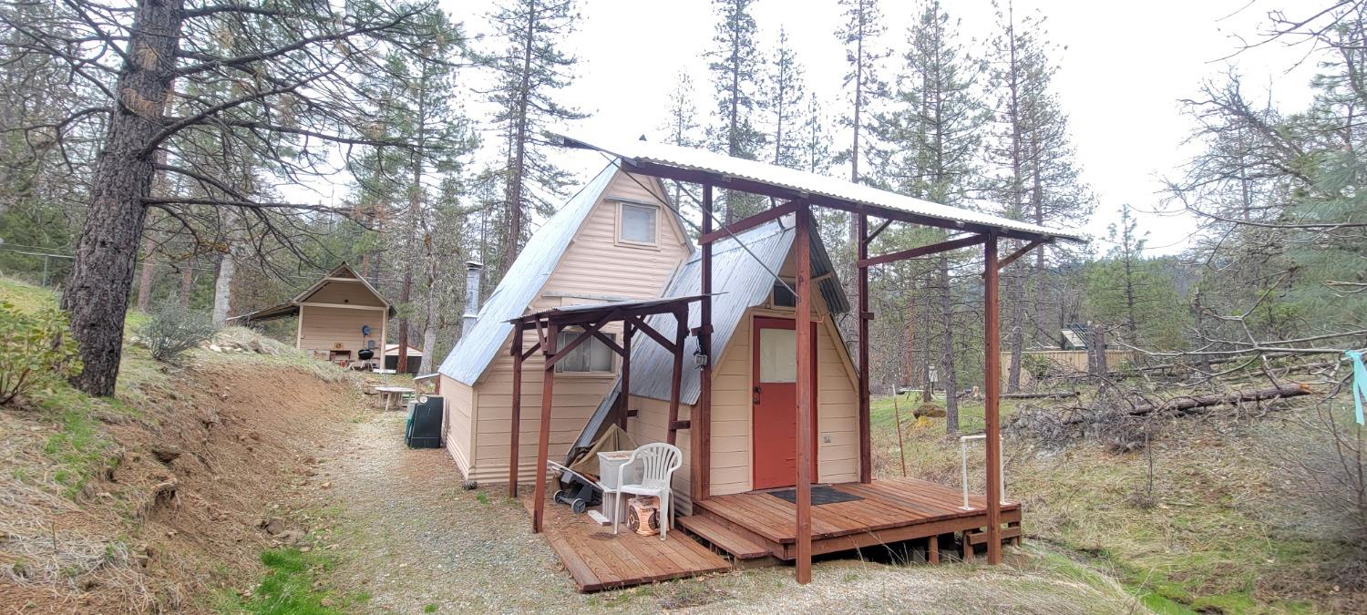 2450 White Rock Road Platina, CA 96076 - Photo 6 of 25 a view of a small house in the forest