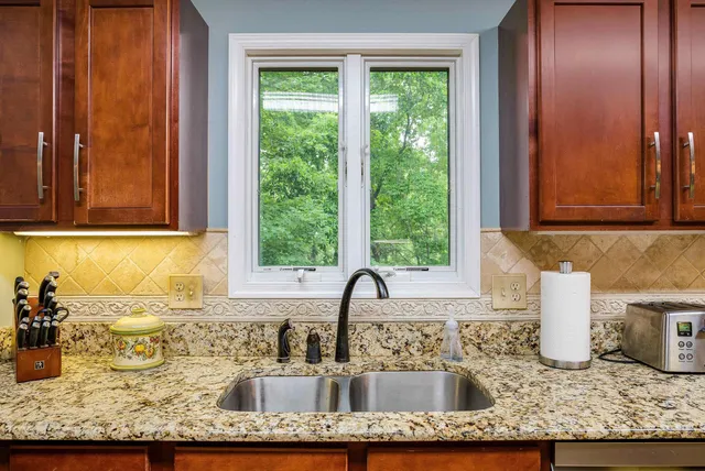 a view of balcony with furniture and wooden floor