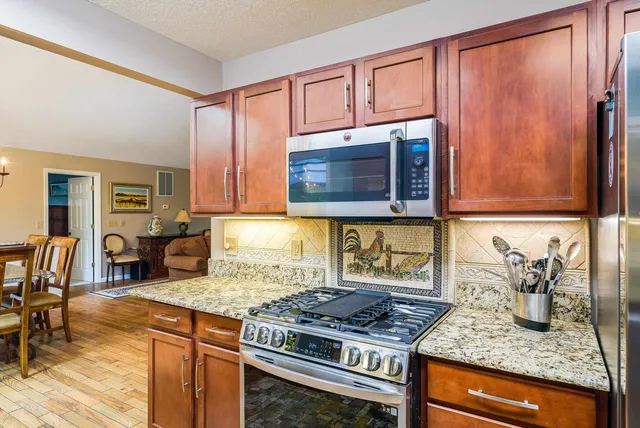 a bedroom with a bed and a table