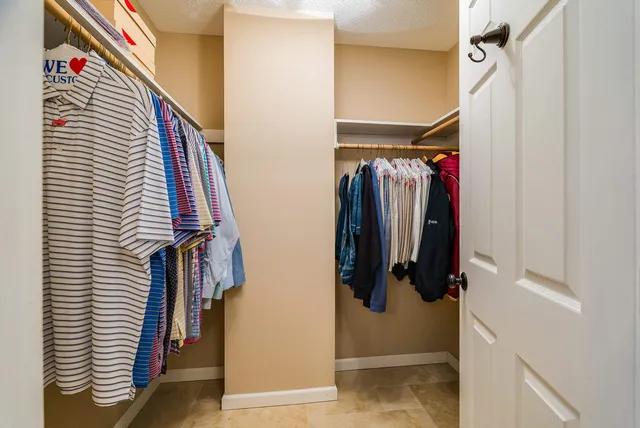 a view of a livingroom with workspace and a couch