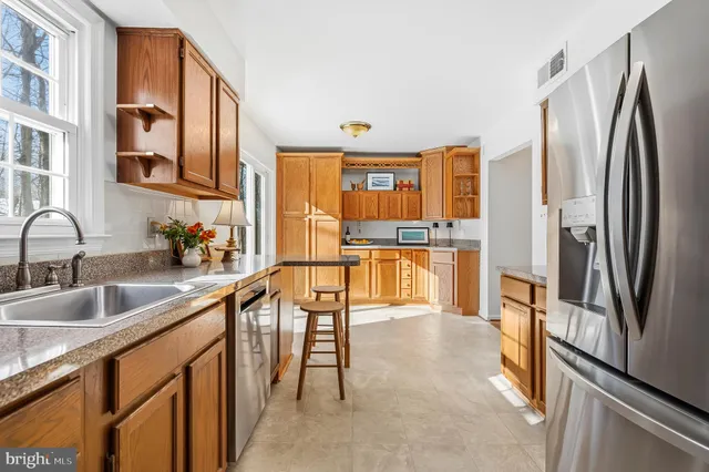 $590,000 | 7433 Spring Tree Drive, Springfield, VA 22153